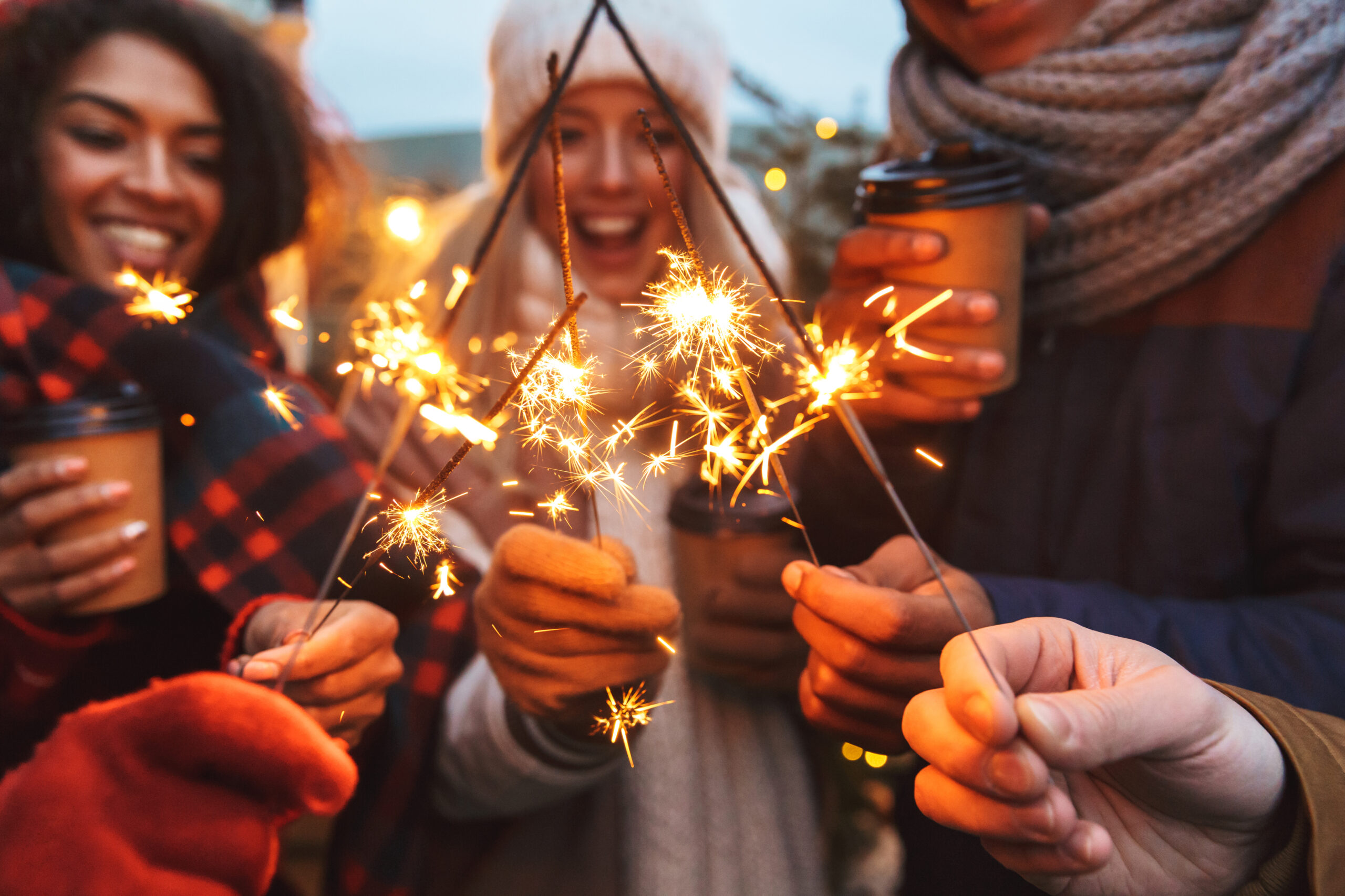 People holding sparklers